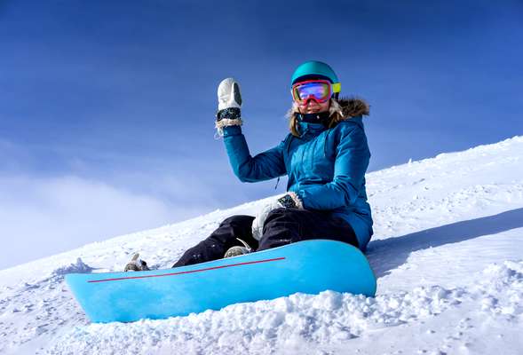 Complete ski or snowboard equipment and waterproof clothes is provided